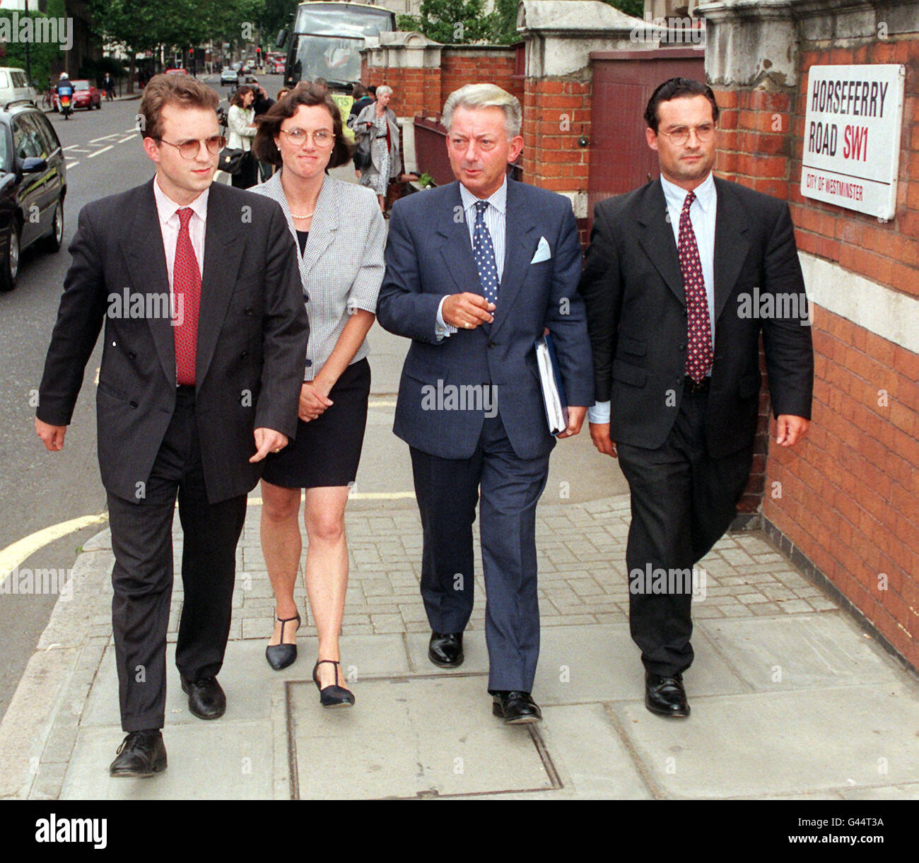 The family of Mrs Carole Burwash leaving Westminster Coroner's court today (Tuesday) after the Coroner Dr Paul Knapman recorded an accidental death verdict. (l/r) Son Rupert, daughter Caroline Buckley, husband Mr Brian Burwash and son Nigel. See PA Story INQUEST Overdose. Photo by John Stillwell/PA. Stock Photo