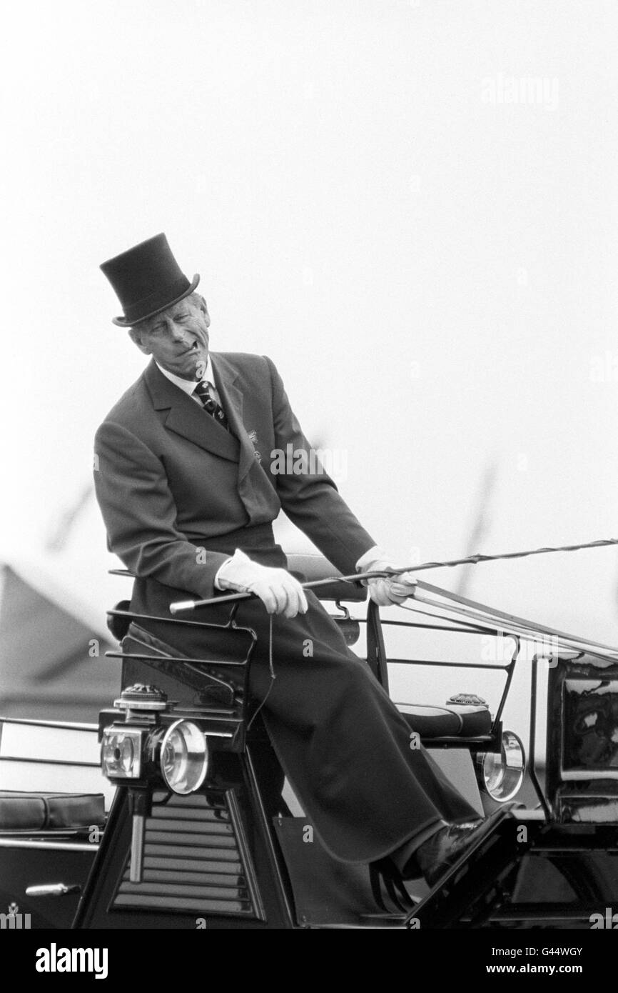 The expression on the Duke's face tells it all. He was impersonating how his horse was biting his bit in an explanation to the judge during the World F.E.I. Four-in-Hand Driving Championship at the Silver Ring racecourse at Ascot, Berkshire Stock Photo
