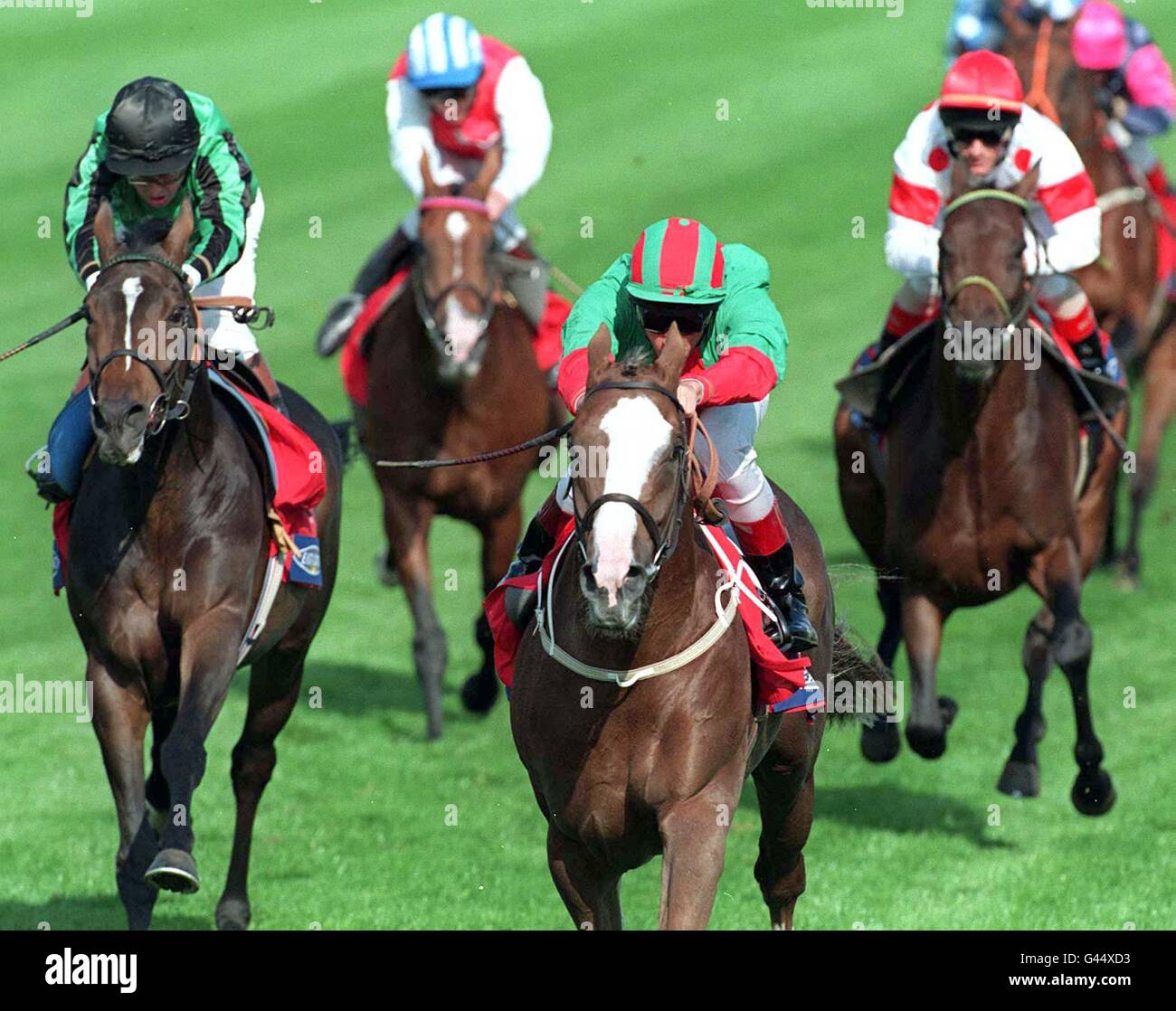 Double Trigger (centre) with Frankie Dettori up win the Doncaster Cup for the second consecutive year at Doncaster Races today. (Thursday). Photo by John Giles/PA. Stock Photo