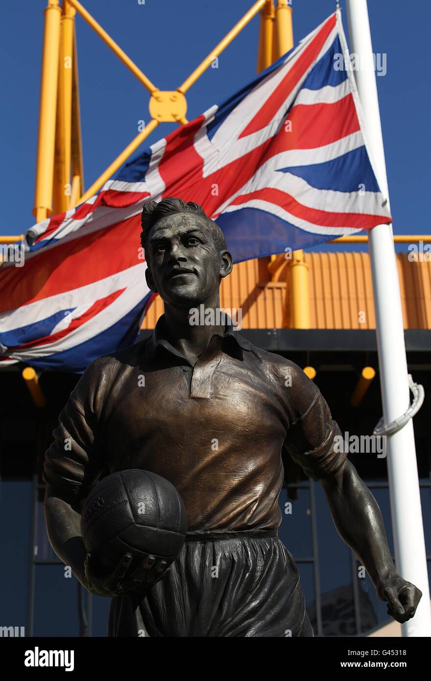 A statue of wolves legend billy wright stands outside molineux hires