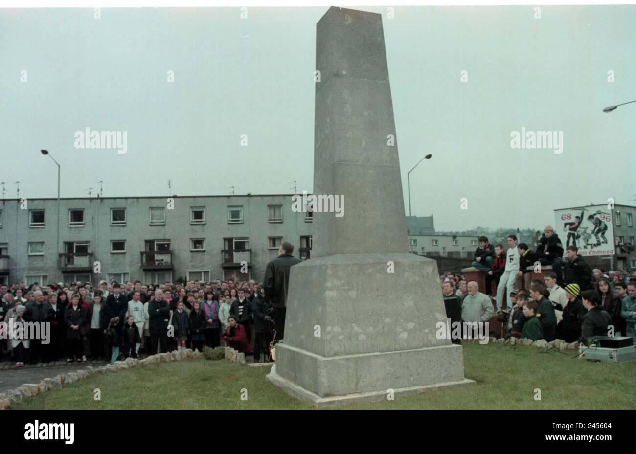 Residents of the Bogside in Londonderry attend a 25th anniversary memorial service in memory of the fourteen people killed by British Army paratroopers on Bloody Sunday in 1972. See PA story ULSTER Sunday. Picture by Brian Little/PA Stock Photo
