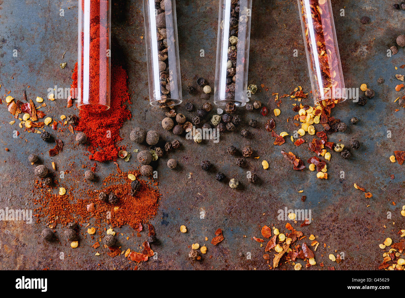 Spicy background with assortment of different hot chili and allspice