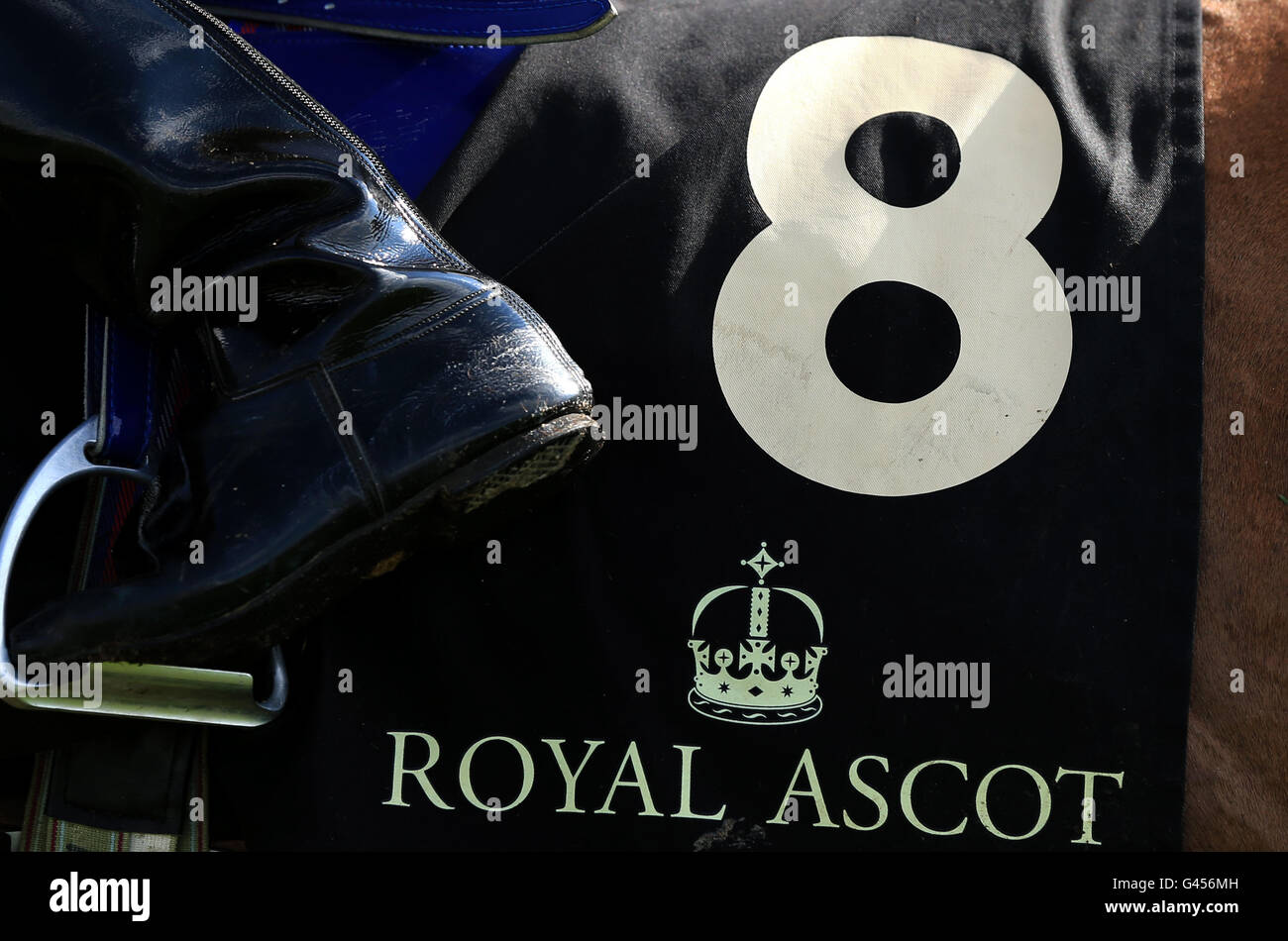 Detailed view of a jockey's foot and saddle during day four of Royal