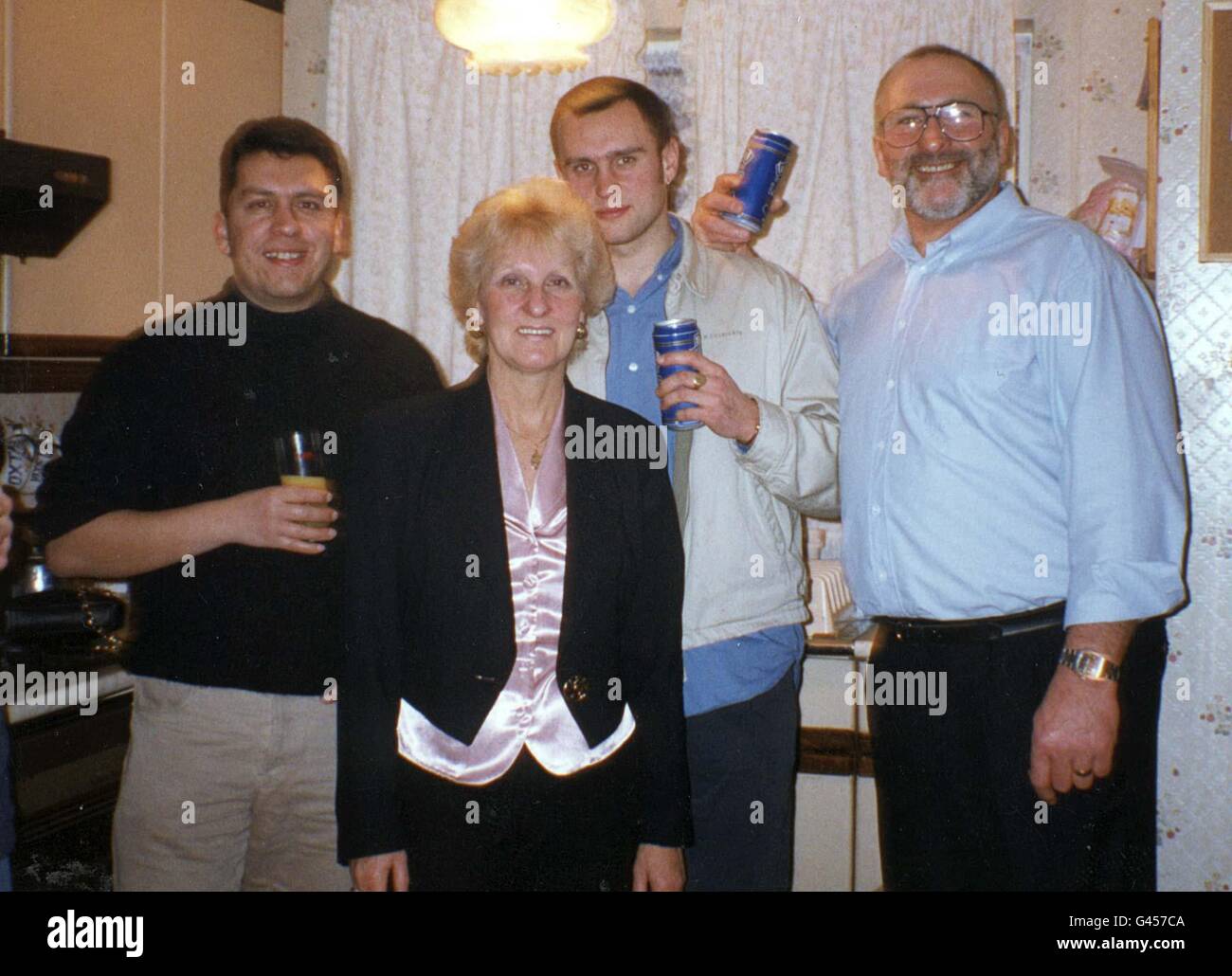 Undated filer of road-rage vicitm Stephen Cameron (2nd right), who was murdered three weeks ago at the Swanley interchange on the M25 in Kent, with his family, (l-r) brother Michael, mother Toni, and father Ken. Stephen's parents have spoken of the daily torment of knowing their son's killer is still on the loose. PA. SEE PA STORY POLICE Rage. Stock Photo