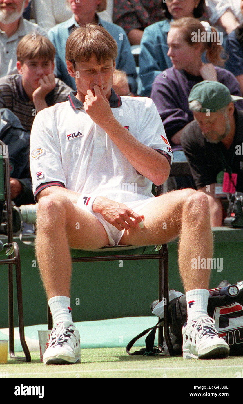 Australia's Jason Stoltenberg in a contemplative mood on No 1 Court this afternoon (Saturday). Stoltenberg lost in straight sets to Richard Krajicek in their semi final match. Photo byFiona Hanson/PA. Stock Photo