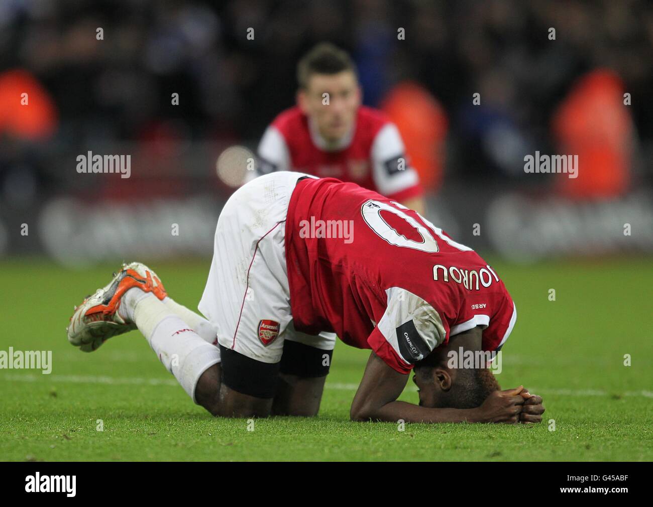 Soccer - Carling Cup - Final - Arsenal v Birmingham City - Wembley Stadium. Arsenal's Johan Djourou dejected after the final whistle Stock Photo