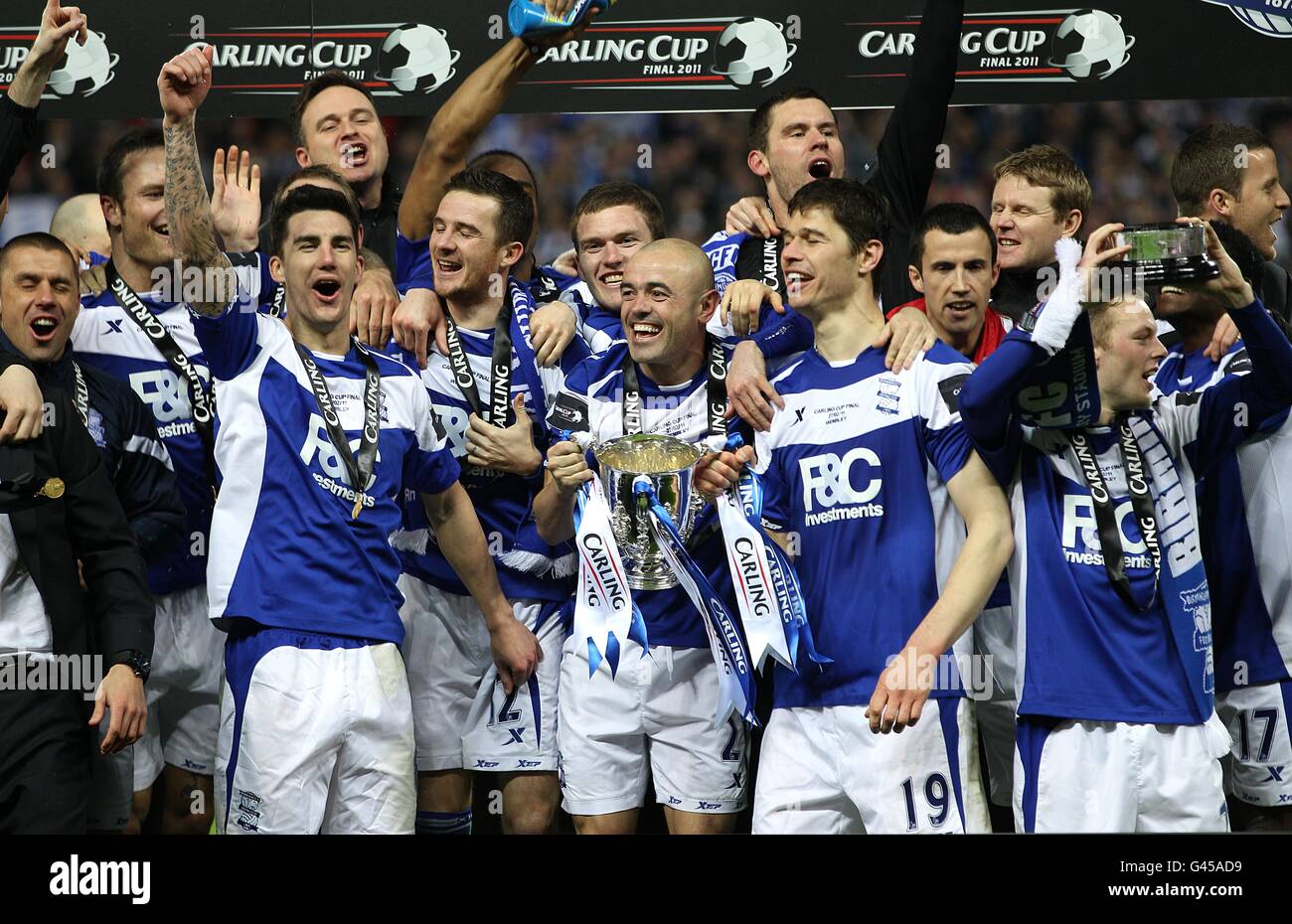 Soccer - Carling Cup - Final - Arsenal v Birmingham City - Wembley Stadium. Birmingham City's Stephen Carr (centre) and his team-mates celebrate their victory with the trophy Stock Photo