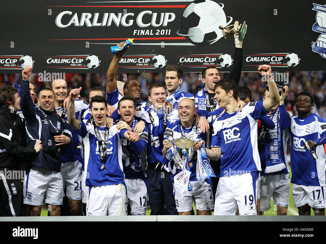 Birmingham City's Stephen Carr (number 2) and his team-mates celebrate their victory with the trophy Stock Photo