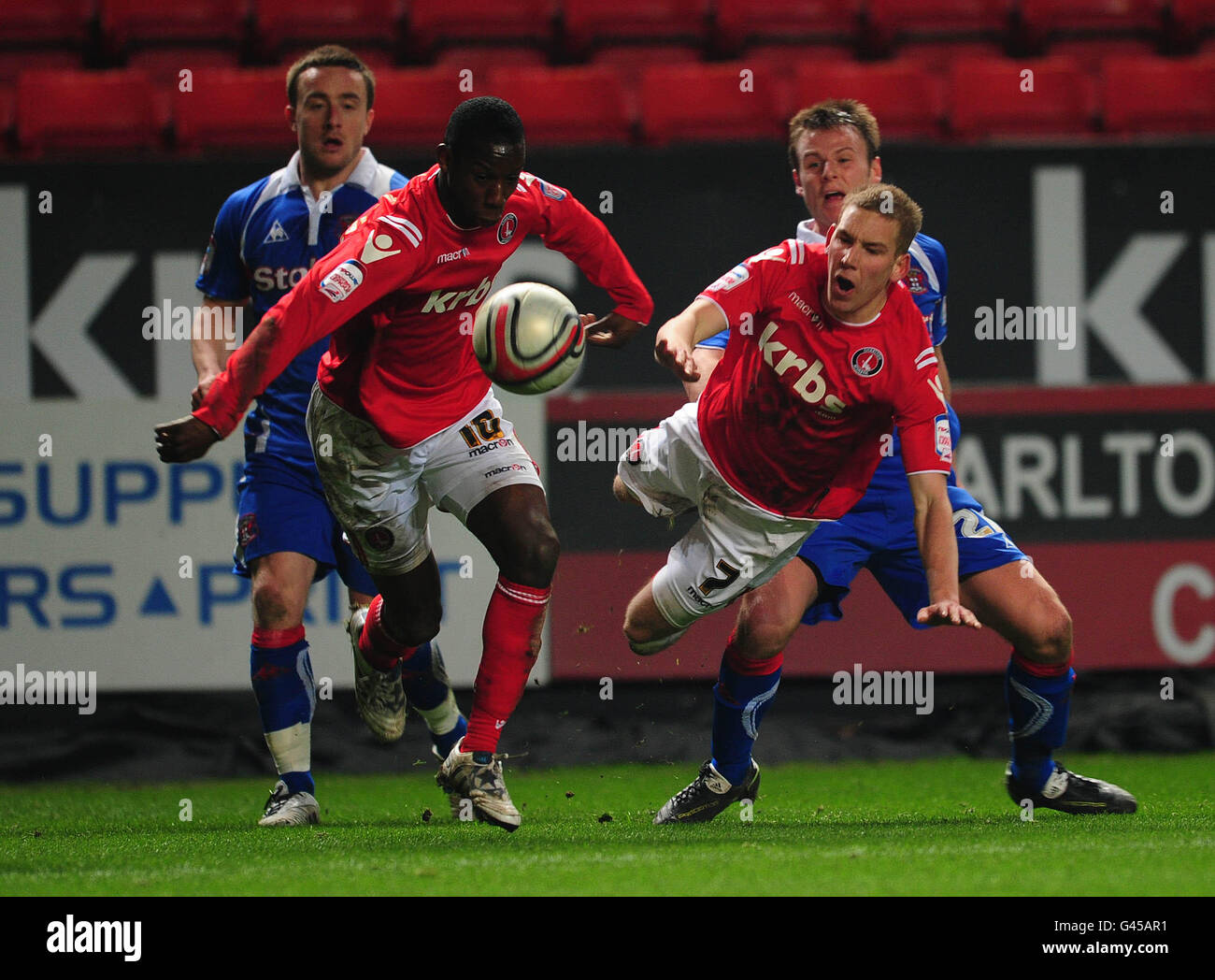 Soccer - npower Football League One - Charlton Athletic v Carlisle United - The Valley. Charlton Athletic's Bradley Wright-Phillips and Scott Wagstaff battle through the Carlisle United's defence Stock Photo