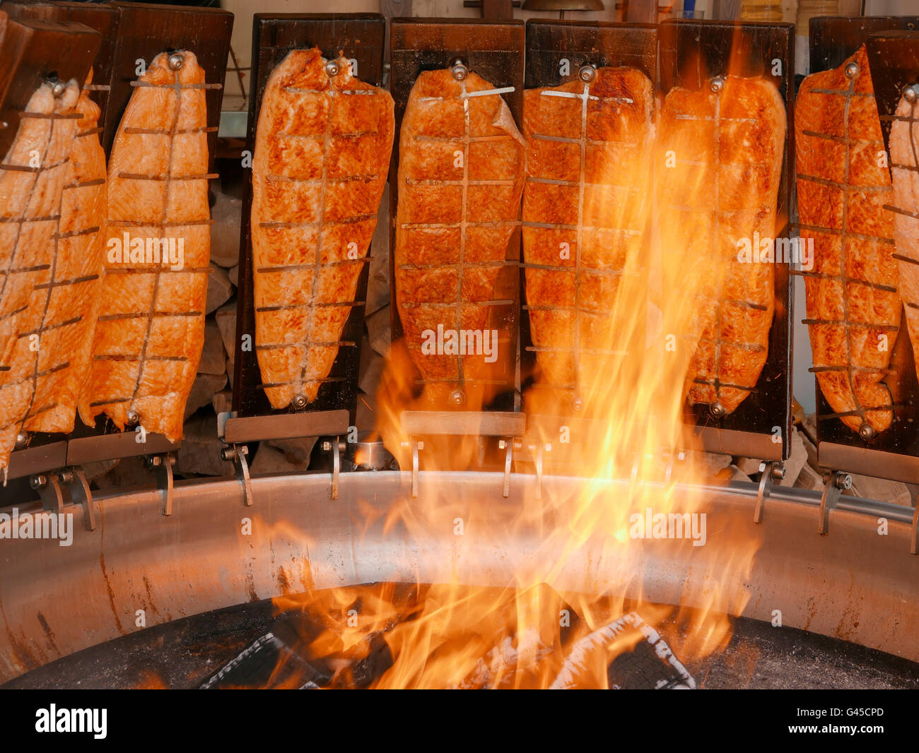 BBQ Roasting Roasted Salmon filet on open fire Stock Photo