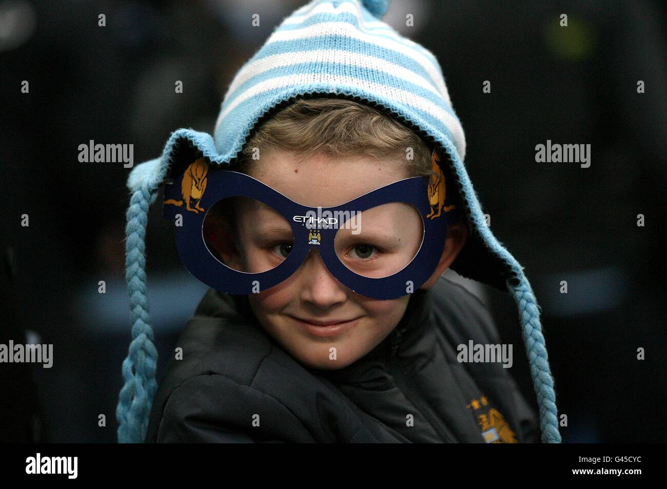 Soccer - Barclays Premier League - Manchester City v Wigan Athletic - City of Manchester Stadium. A young Manchester City fan in the stands Stock Photo