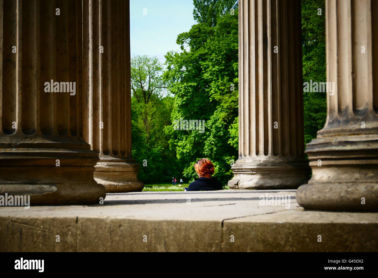 In Spring People enjoy freetime in Nymphenburg Park Munich Germany Europe Stock Photo