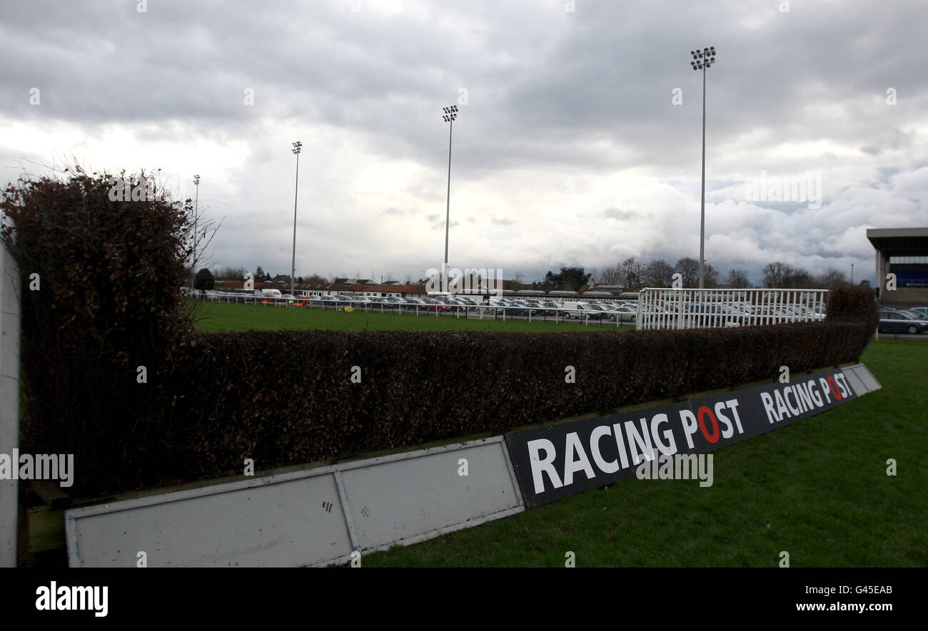 Horse Racing - Racing Post Chase Day - Kempton Park Racecourse. A general view of Racing Post signage on a fence. Stock Photo