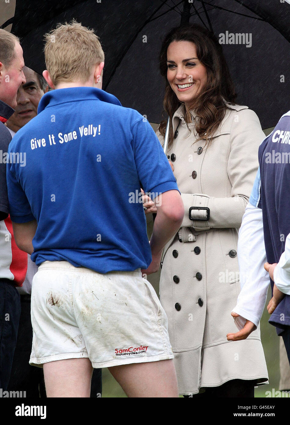 Kate Middleton chats with a member of a Tug of War team at Greenmount College in Co Antrim, during a visit to Northern Ireland. Stock Photo