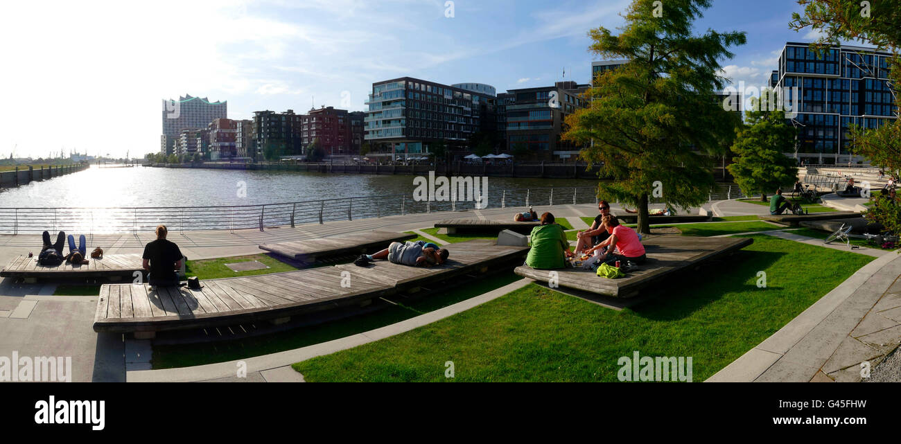 Europe Germany Hamburg Hafencity property real estate people resting at Marco-Polo-Terrace Stock Photo