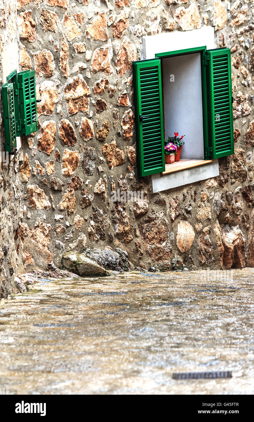 Spanish small house with green shutters on Mallorca, Spain Stock Photo