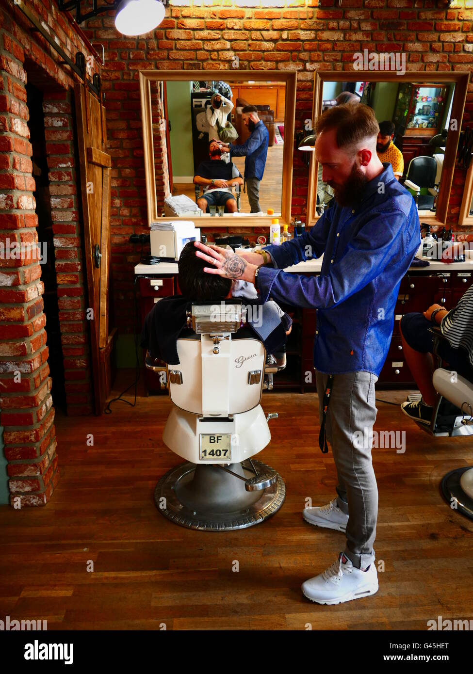 Europe Germany Cologne Koln Koeln Barber shop in trend Stock Photo Alamy