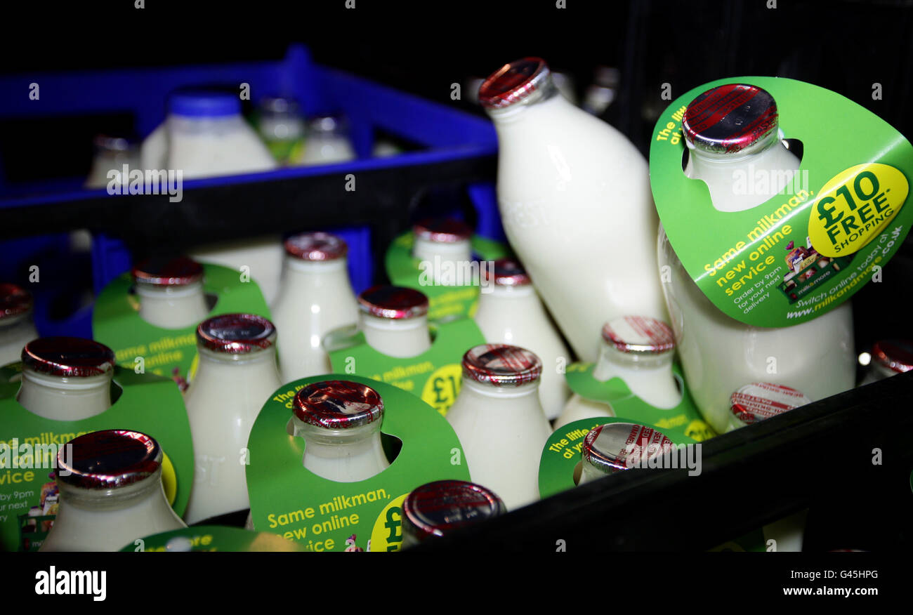 Labels on Dairy Crest milk promoting their online delivery service in Greater Manchester. Stock Photo