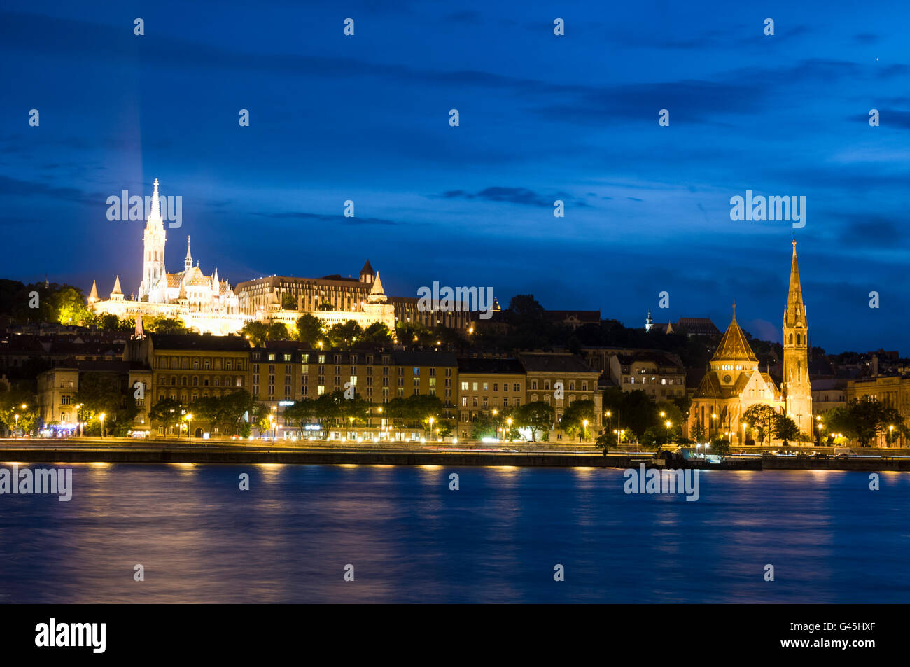 Skyline of the Matthias Church on the Fishermen's Bastion at Buda Castle Hill above the River Danube in Budapest, Hungary. Bud Stock Photo