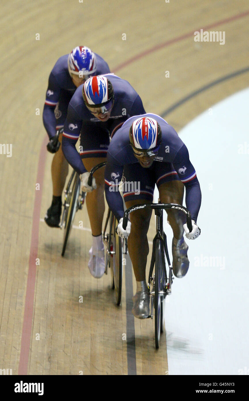 France's Gregory Bauge leads teammates Kevin Sireau (centre) and Michael D'Almeida during the Men's Team Pursuit Stock Photo