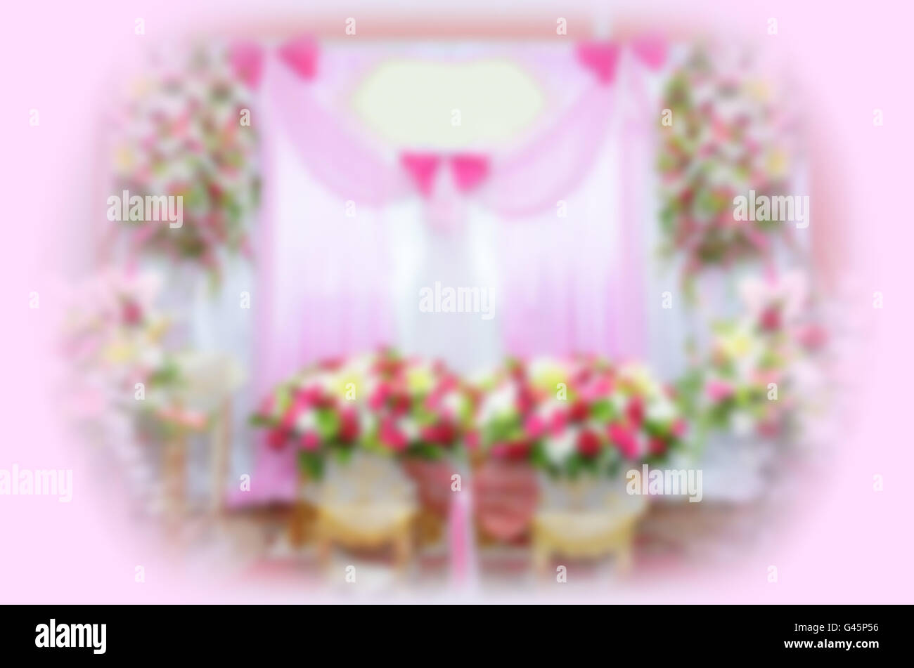 Blur background of stage curtains and flower arch for wedding ceremony in  thailand Stock Photo - Alamy