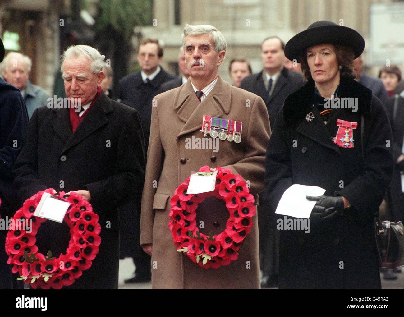 Sara Jones, widow of Lieutenant Colonel H Jones, who died commanding 2 Para and later awarded the VC, joins Desmond Keoghane (cen) and former governor of the Falklands Sir Rex Hunt at a ceremony to remember those who died during the Falklands conflict at the Cenotaph in Whitehall, central London today (Sat). Traffic came to a halt as veterans and bereaved relatives laid wreaths at the monument in a low-key ceremony attended by about 100 people. Mr Keoghane's son Kevin was a Welsh guard who was killed on board the Sir Galahad. See PA story DIPLOMATIC Falklands. Photo by Sean Dempsey/PA. Stock Photo