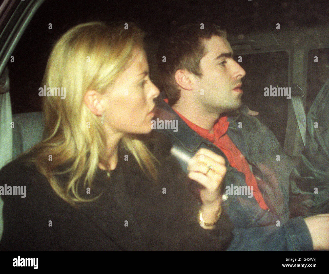 Oasis singer Liam Gallagher and girlfriend Patsy Kensit leave their London home today (Friday), amid rumours that the couple are about to be married. See PA story SHOWBIZ Wedding. Photo by Tony Harris/PA Stock Photo