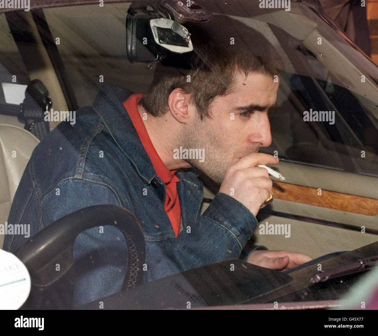 Liam Gallagher car shot Stock Photo