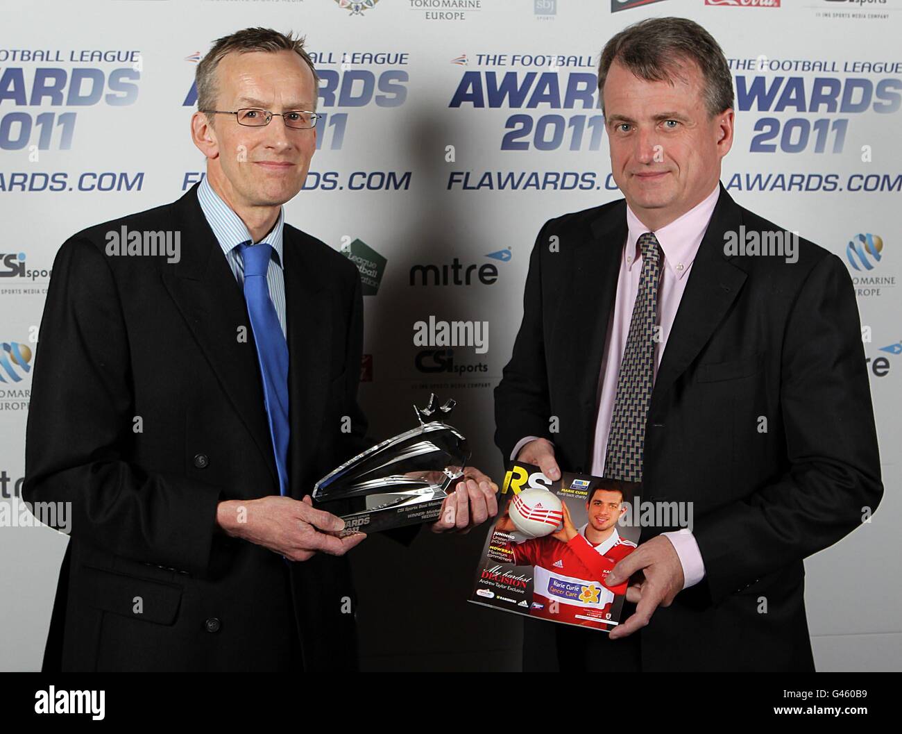 Redsquare's Graham Bell Senior Media And Public Relations officer wins the Csi Sports Best Matchday Programme for Middlesborough Matchday Programme from Csi Sports Chief Executive Chris Guinness at the 2011 Football League Awards at the Brewery, London. Stock Photo