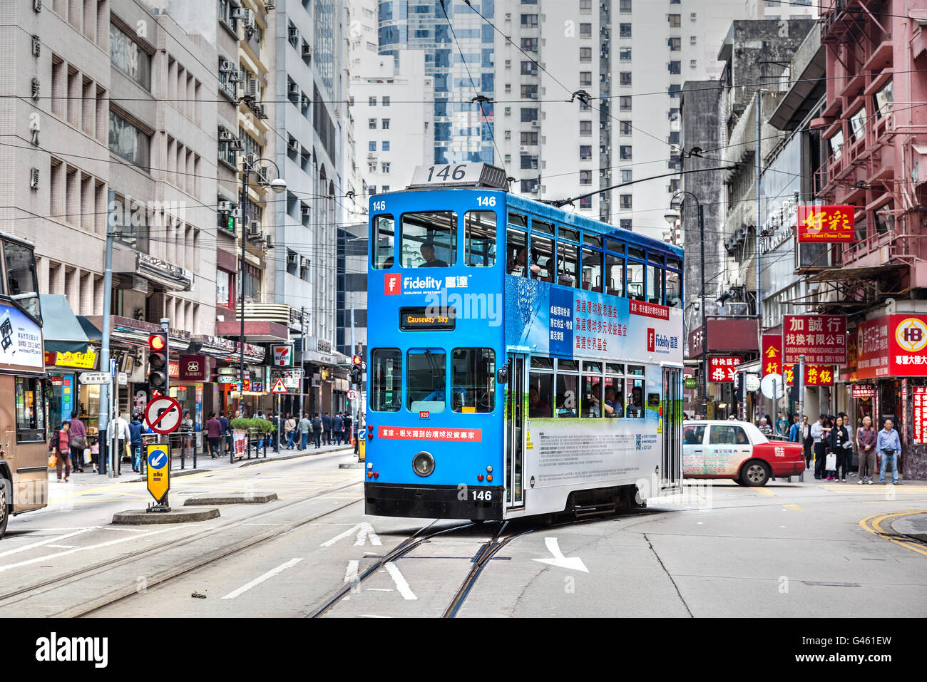 Hong Kong China March 30 2015 An Electric Tram Bus Turns Into Des Voeux Road In The Downtown Central District Of Hong Kong Stock Photo Alamy