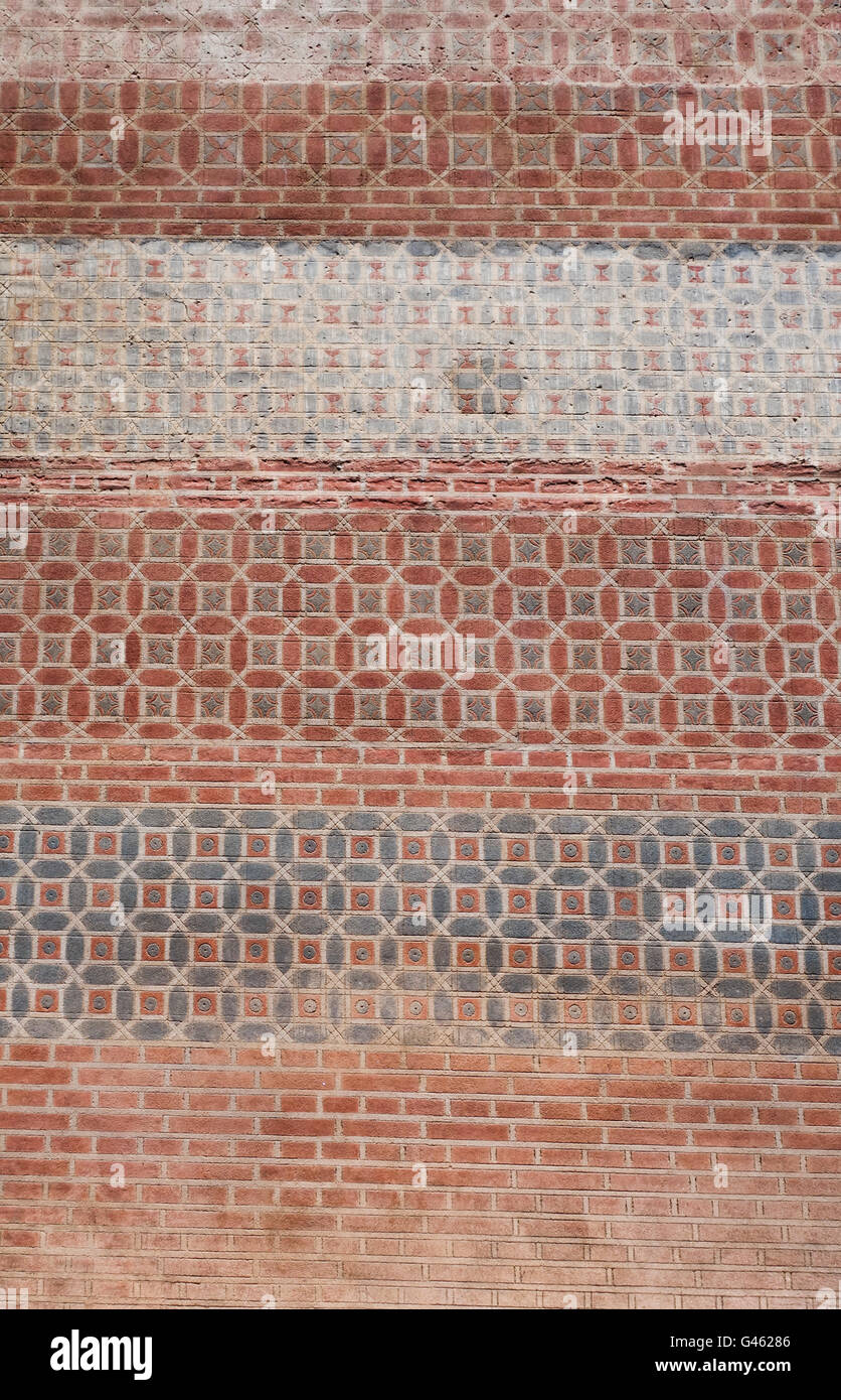 Brick wall with moorish style pattern in Santa Maria street, Malaga, Andalusia, Spain. Stock Photo