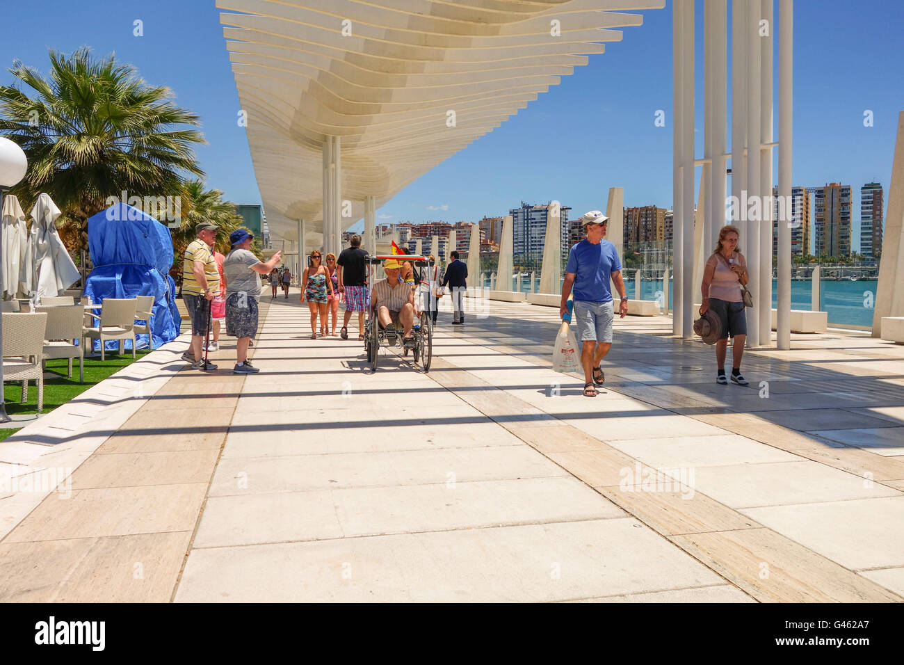 Modern Marina and waterfront promenade in Malaga named "Palmeral de las Sorpresas" warf, Malaga, Southern Spain Stock Photo