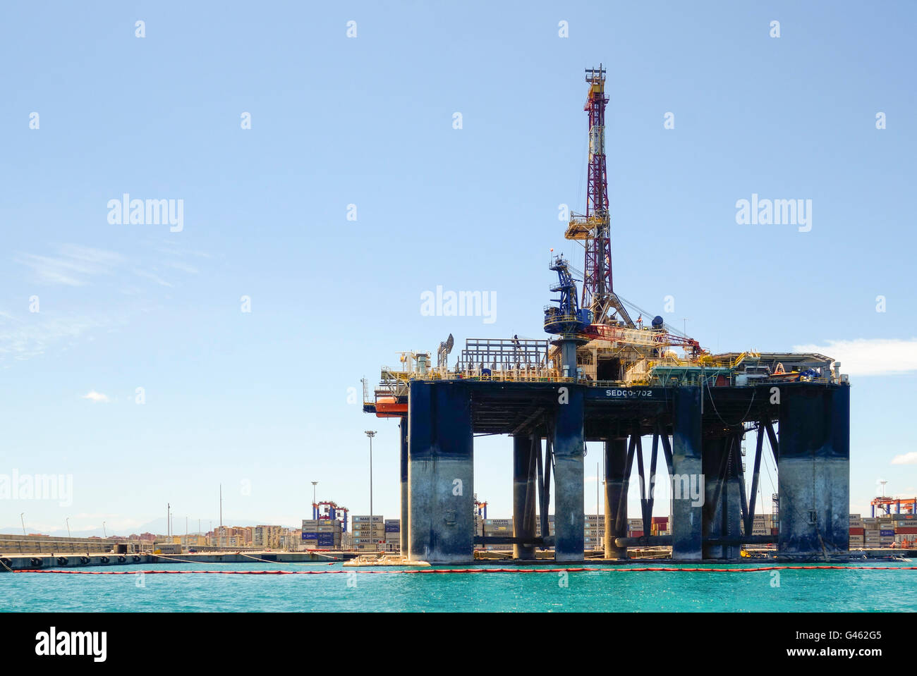 Oil rig Sedco 702, from Liberia moored in Port of Malaga, docked, to be dismantled, Andalusia, Spain. Stock Photo