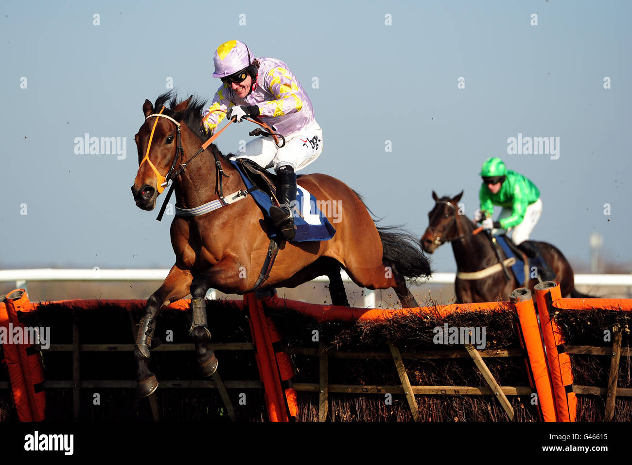 Jockey A P McCoy on Two Kisses during the Emma Lavelle Racing Juvenile Hurdle Stock Photo