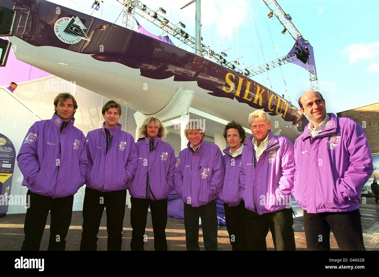 The seven members of the Silk Cut crew at the London Boat Show today (Thursday) with the yacht they hope to win the Whitbread Round the World race in. (L-R) Gordon Maguire, Steve Hayles, Neal McDonald, Lawrie Smith, Adrian Stead, Jason Carrington and Russell Pickthall. Photo by Tony Harris/PA. Stock Photo