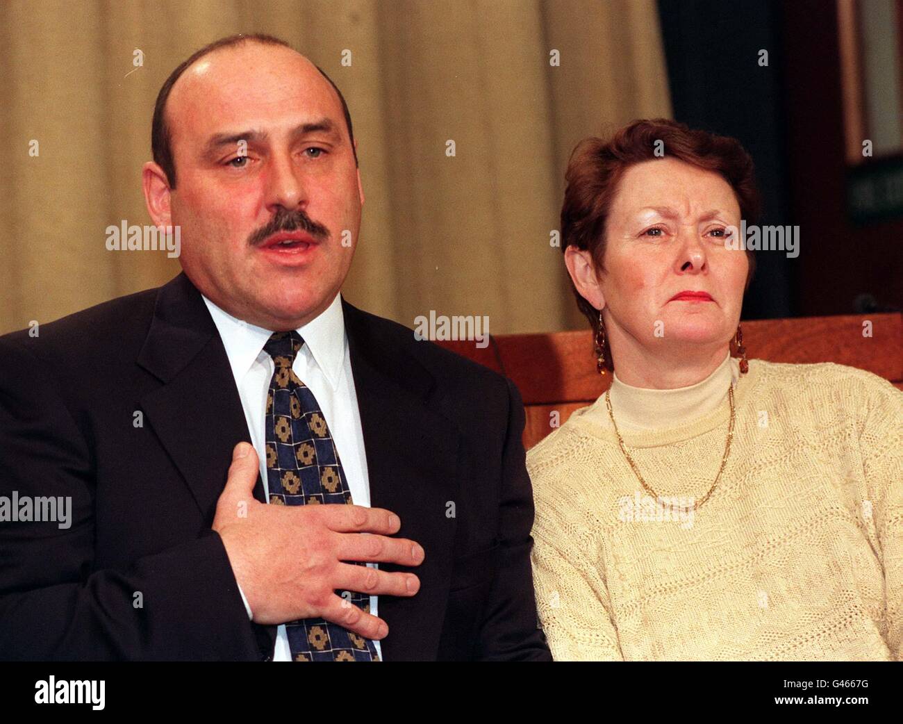 Heartbroken parents John and Maria Hitchens issue a plea to teenagers to turn their backs on drugs during a news conference in London today (fri) following the death of their son, suspected Ecstasy victim Robert. Robert is thought to have taken Ecstasy before he collapsed early on New Year's Day at an all-night party in Heston, west London. The teenager, from Upminster, Essex, was taken to Ealing Hospital where he died later that afternoon. A post-mortem examination this morning was inconclusive. See PA story DEATH Ecstasy. Photo by David Cheskin/PA. (POOL). Stock Photo