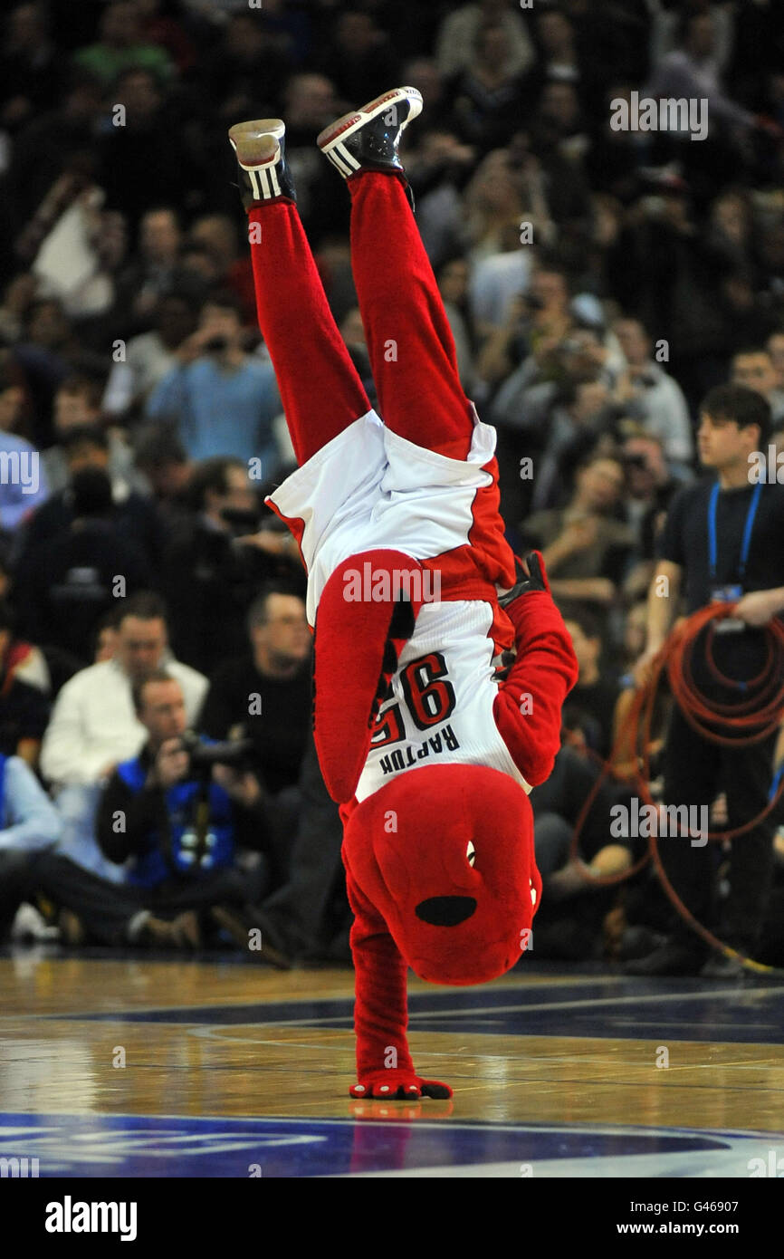 The Toronto Raptors mascot, The Raptor entertains the crowd before the game Stock Photo