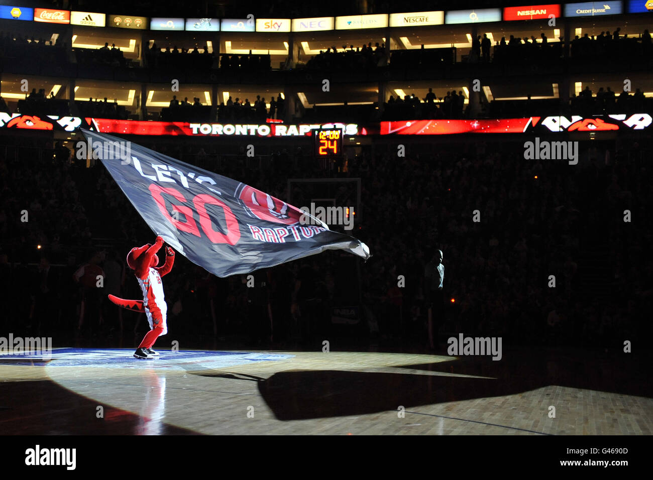 The Toronto Raptors mascot, The Raptor entertains the crowd before the game Stock Photo