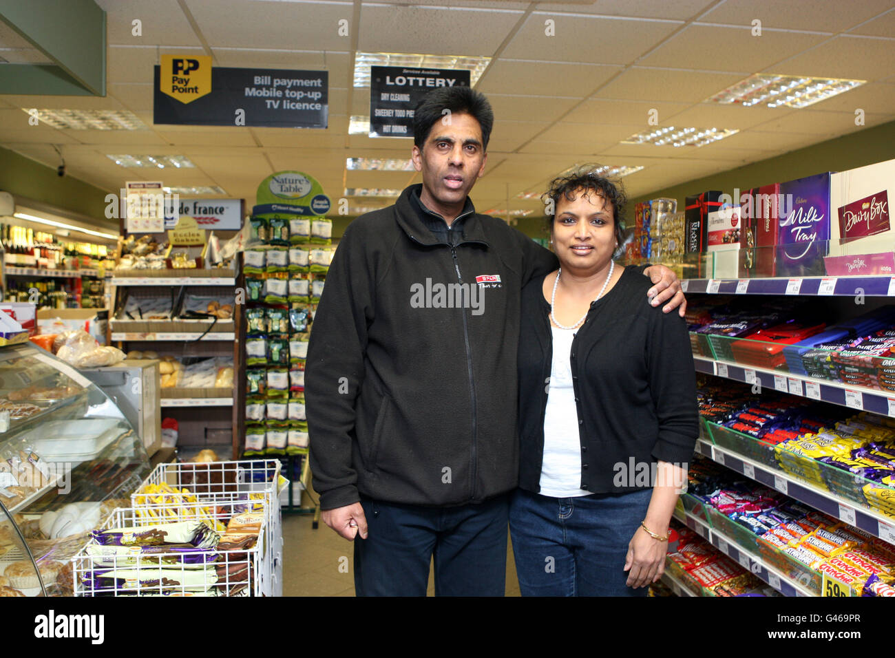 Hasmukh and Chandrika Shingadia who run the Peach's Strore in Upper Bucklebury, Berkshire Stock