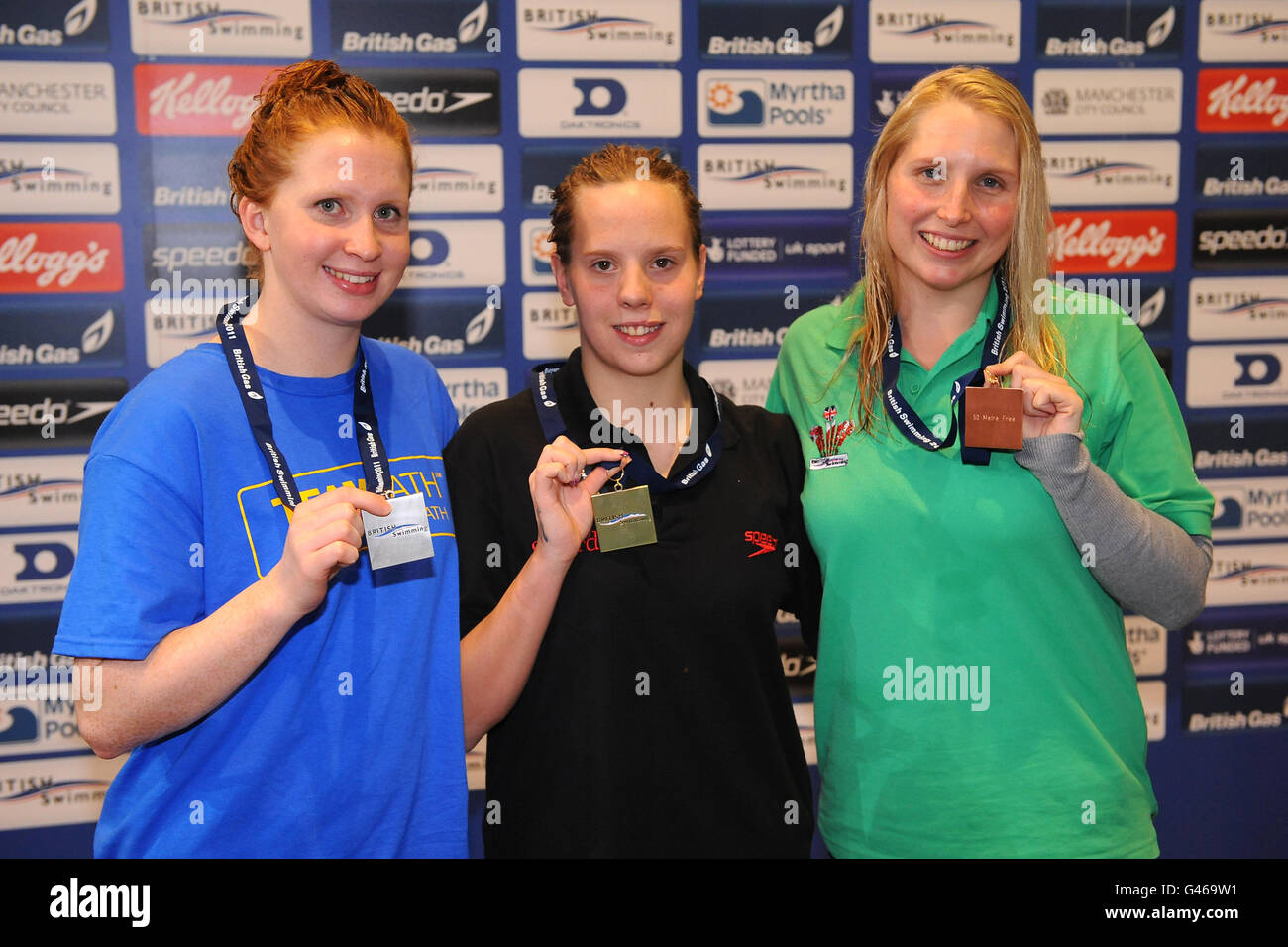 Salford's Louise Watkin (centre), Bath University's Kate Grey (left) and Swansea Performance's Stephanie Millward celebrate winning Gold, Silver and Bronze in the Women's MD 50m Freestyle Final Stock Photo