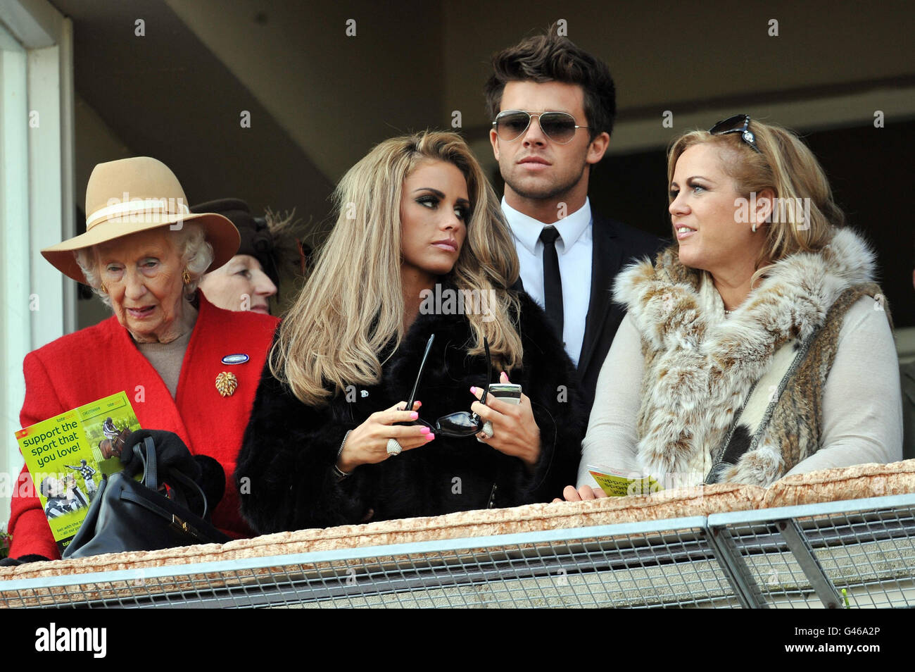 Horse Racing - 2011 Cheltenham Festival - Day Four. Katie Price (centre) with her boyfriend Leandro Penna in the Royal Box during the Gold Cup Day at Cheltenham Racecourse. Stock Photo