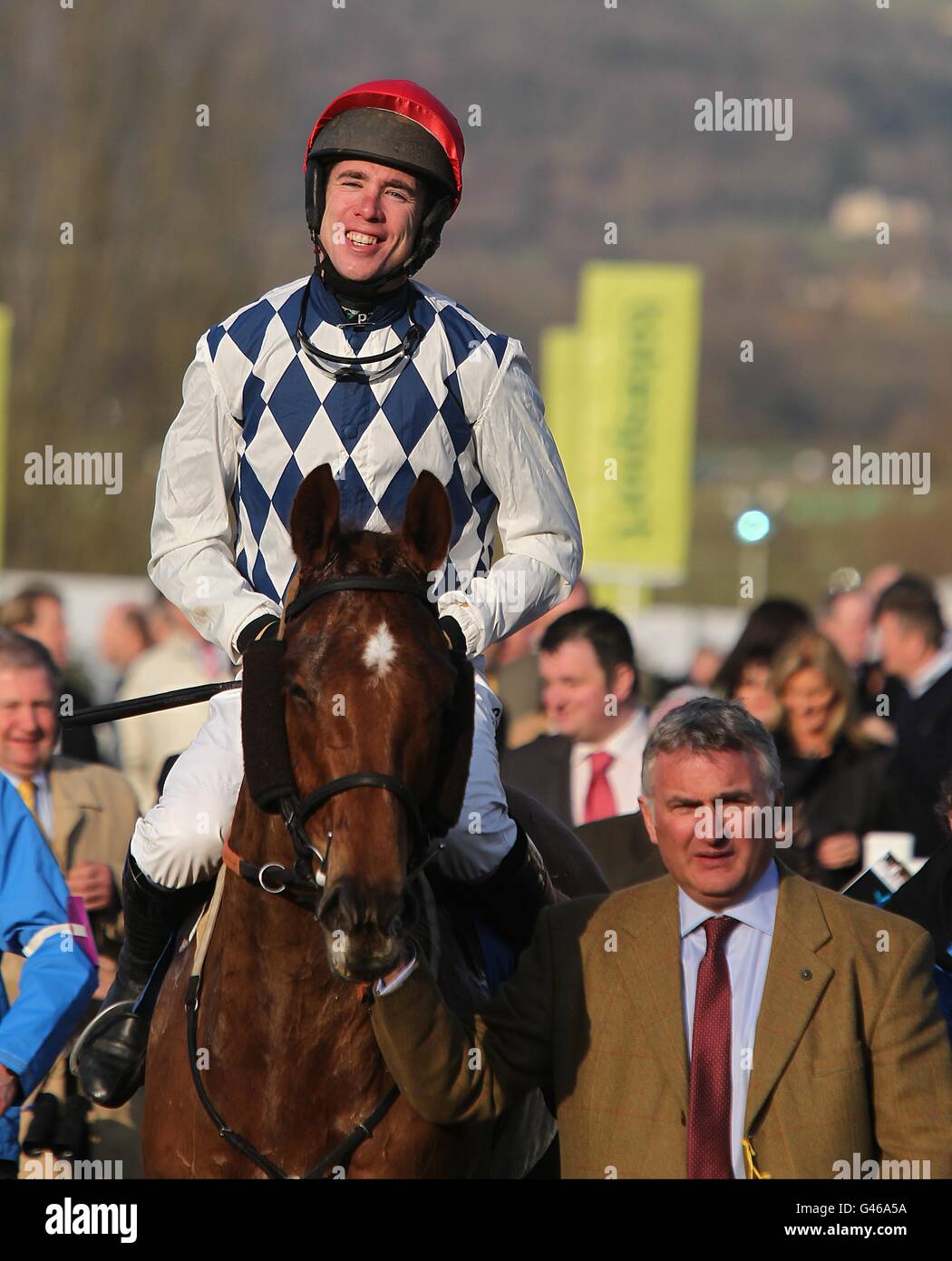 Jockey Derek O'Connor celebrates winning the Christie's Foxhunter Chase Challenge Cup on Zemsky during Gold Cup Day, at the Cheltenham Festival. Stock Photo