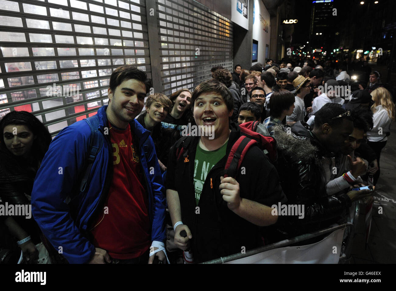 Fans queue outside HMV on London's Oxford Street to buy the new ...