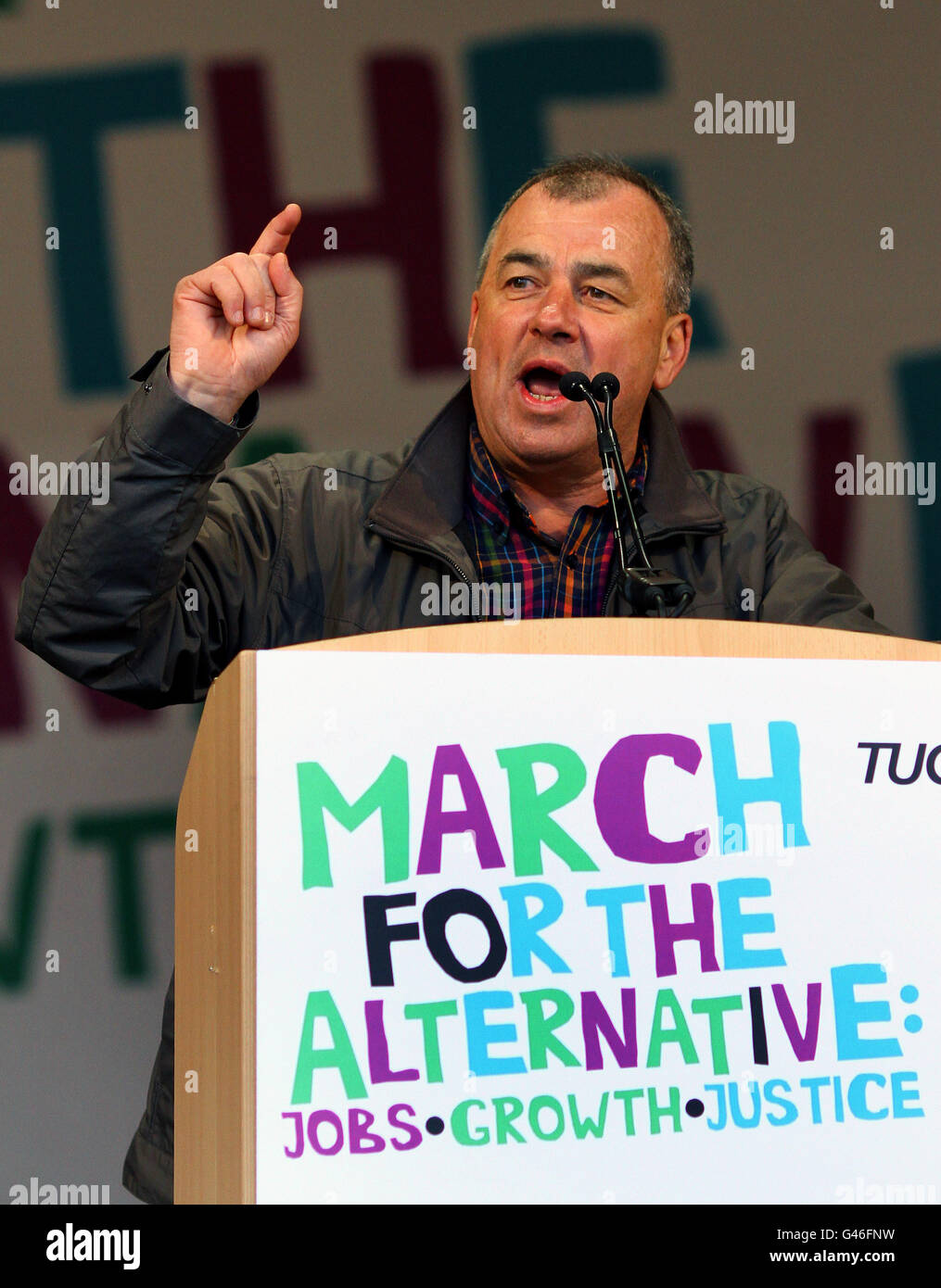 Brendan Barber, General Secretary of the TUC, delivers a speech during a rally in Hyde Park, following the TUC March for the Alternative against government spending cuts. Stock Photo