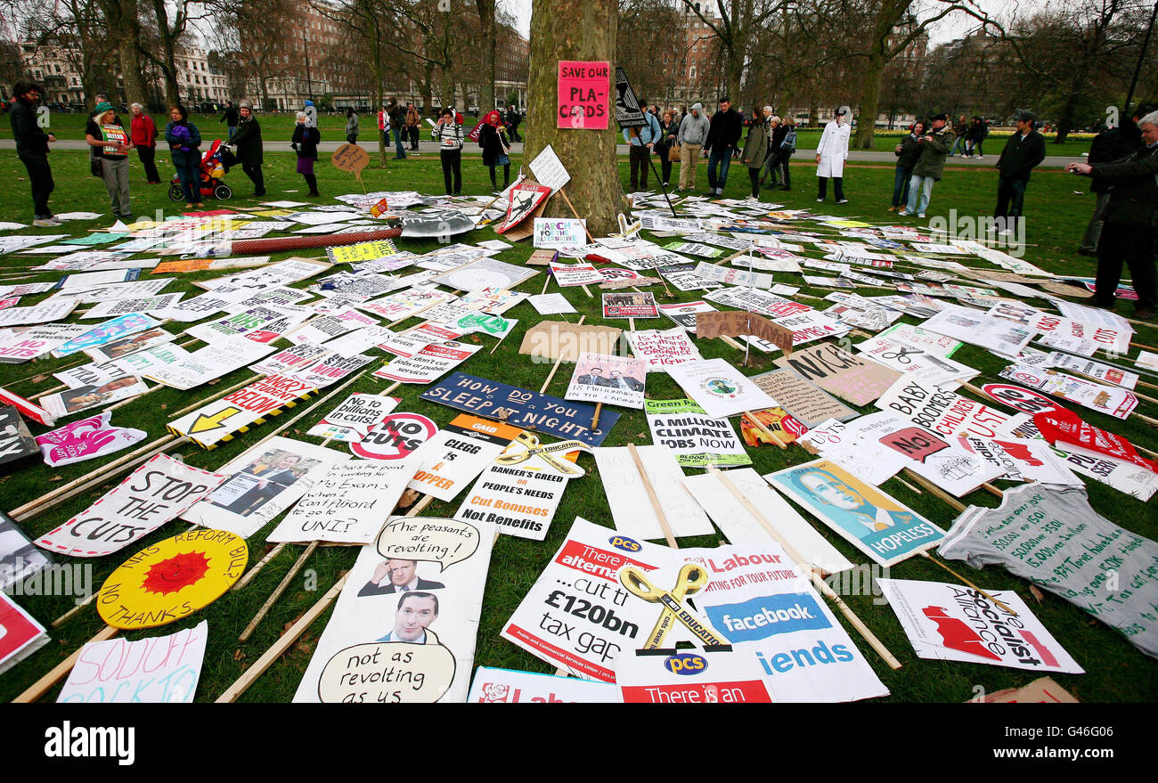 Protest placards are used to create a piece of art after a rally in Hyde Park, London, following the TUC March for the Alternative against government spending cuts. Stock Photo
