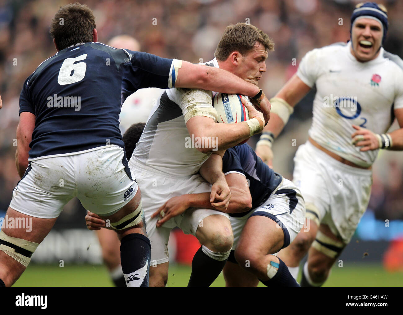 England's Mark Cueto finds no way through Scotland's defence during the RBS 6 Nations Match at Twickenham, London. Stock Photo