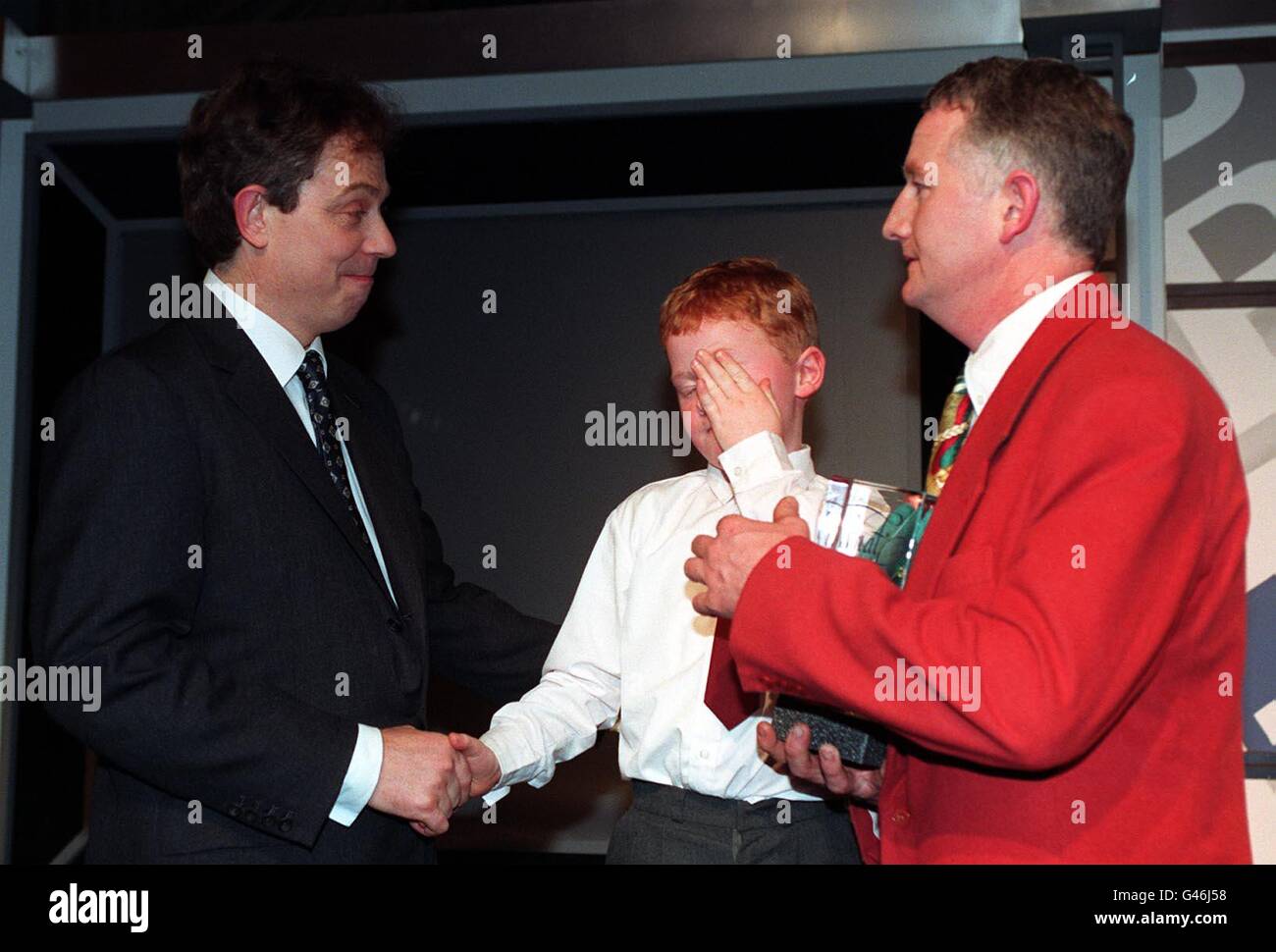 Graham Guerin and son, Cathal,7, during the What The Papers Say Awards