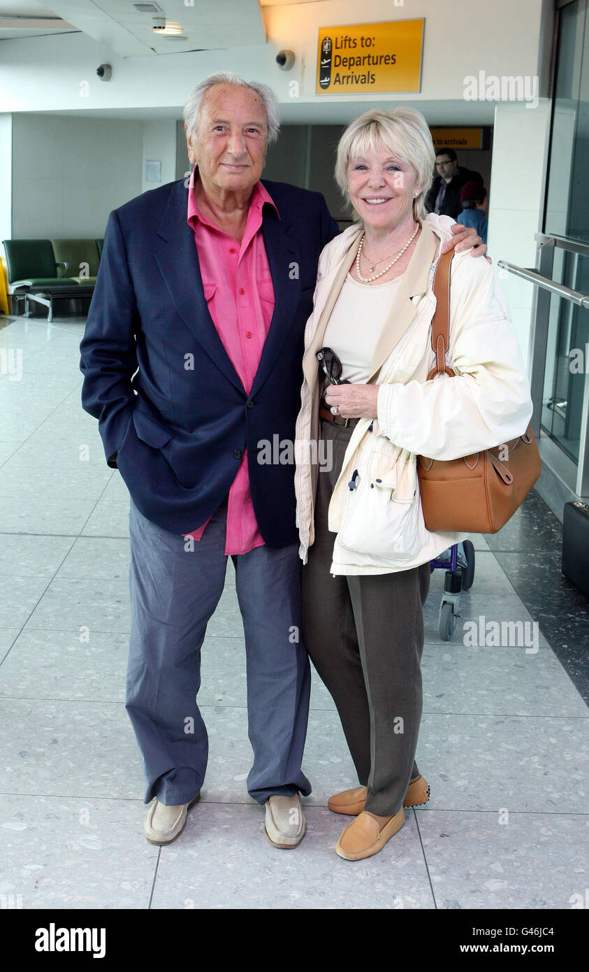 Michael Winner with Geraldine Edwards at Heathrow Airport Stock Photo