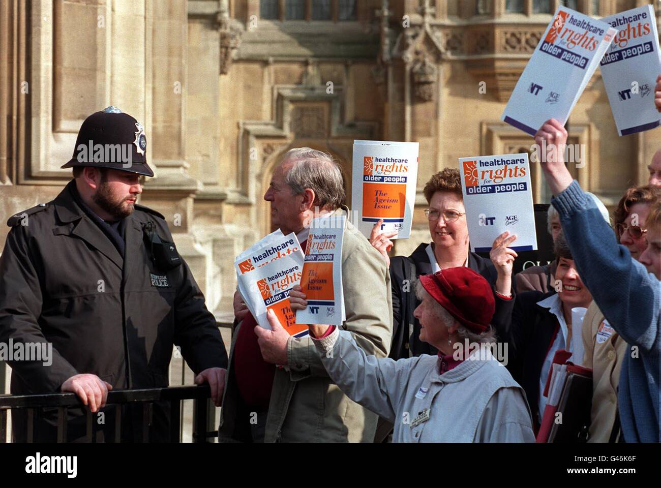 Pensioners and nurses wait outside the House of Commons to lobby MPs on healthcare rights for older people. Photo By Rebecca Naden/PA Stock Photo