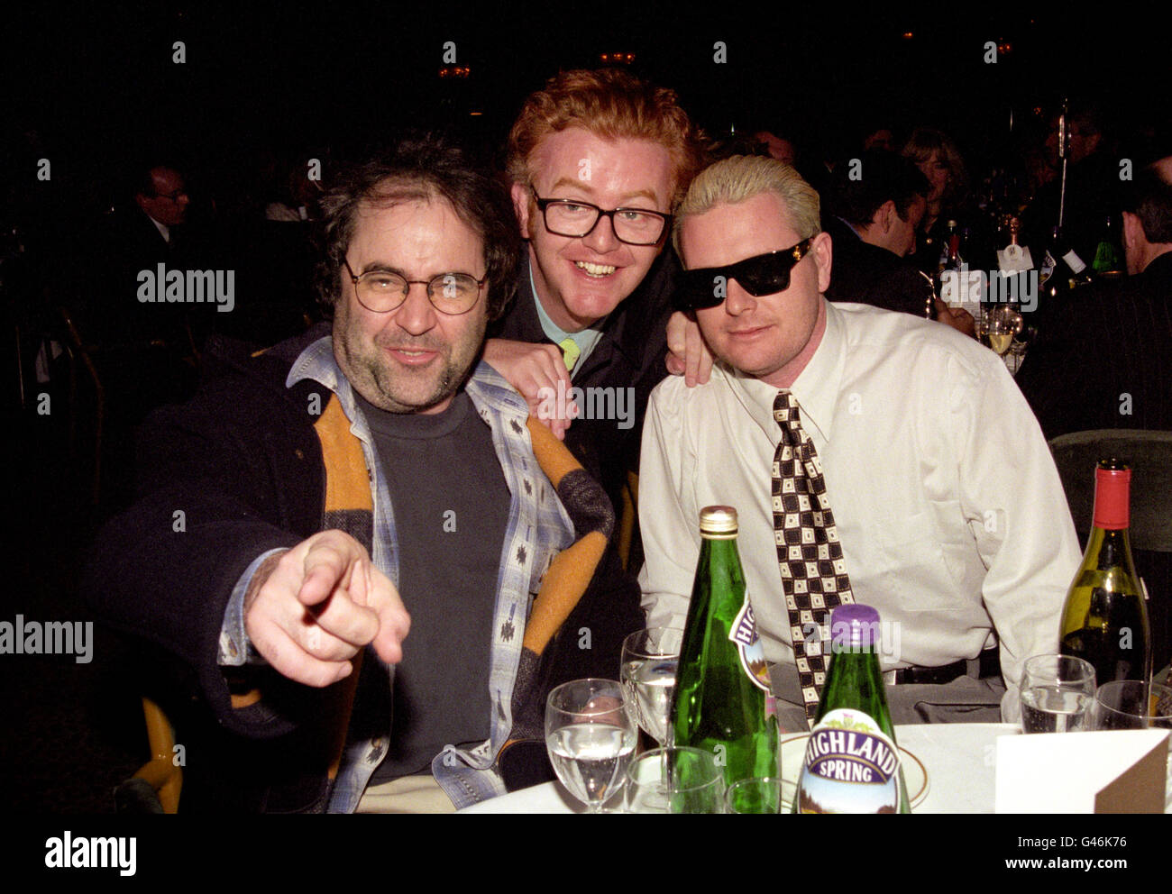 From left: TV/Radio presenters Danny Baker and Chris Evans join England footballer Paul Gascoigne, at the Television and Radio Industries Club (TRIC) Awards ceremony. Stock Photo